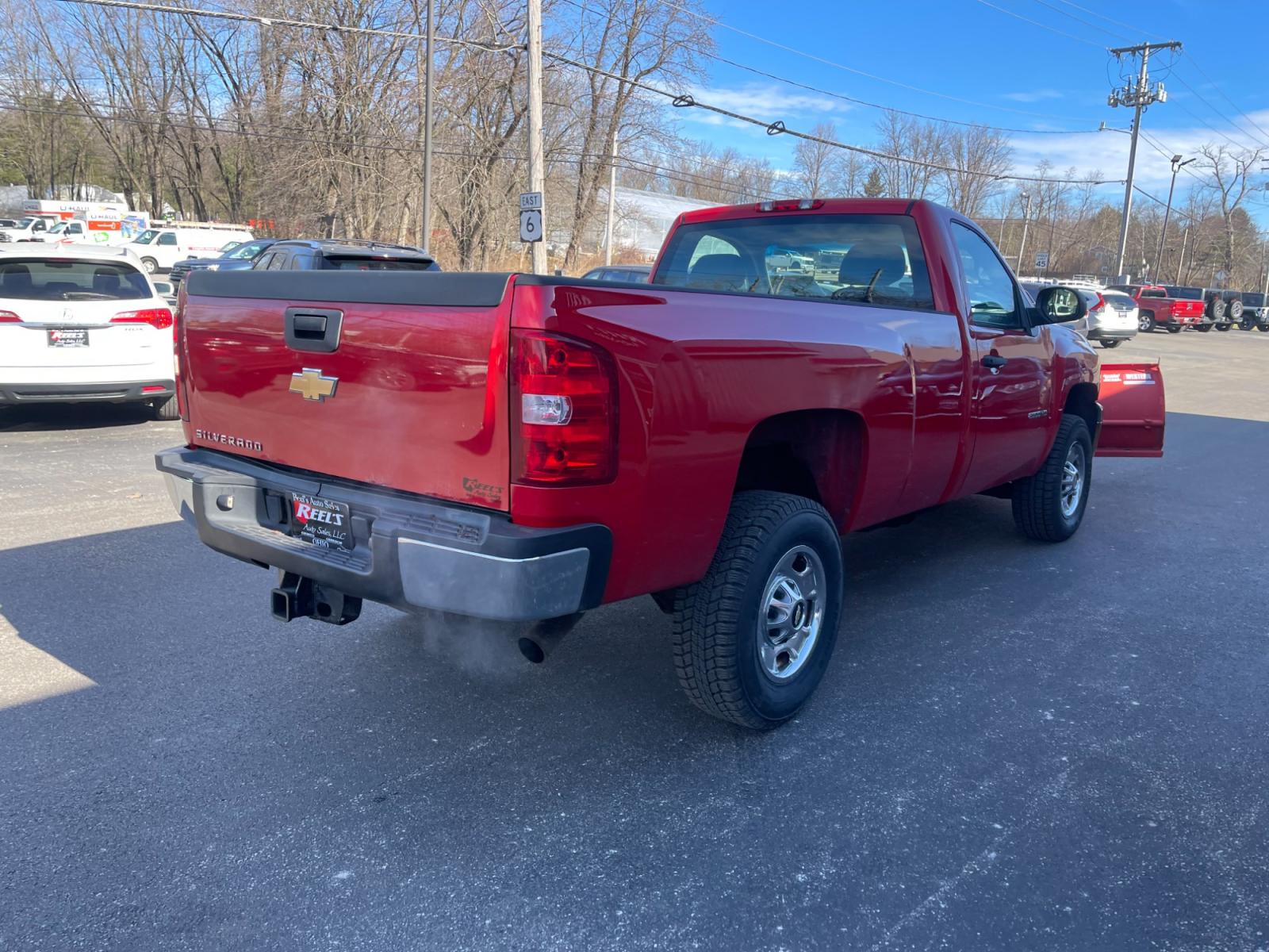2011 Red /Black Chevrolet Silverado 2500HD Work Truck Long Box 4WD (1GC0KVCG8BF) with an 6.0L V8 OHV 16V FFV engine, 6-Speed Automatic transmission, located at 11115 Chardon Rd. , Chardon, OH, 44024, (440) 214-9705, 41.580246, -81.241943 - This 2011 Chevrolet Silverado 2500 Work Truck with a Regular Cab featuring a 6.0L Vortec V8 and a 6-speed transmission is a robust and versatile pickup designed for heavy-duty tasks. Its significant powertrain is well-suited for towing and hauling heavy loads, making it an ideal choice for work in c - Photo #10